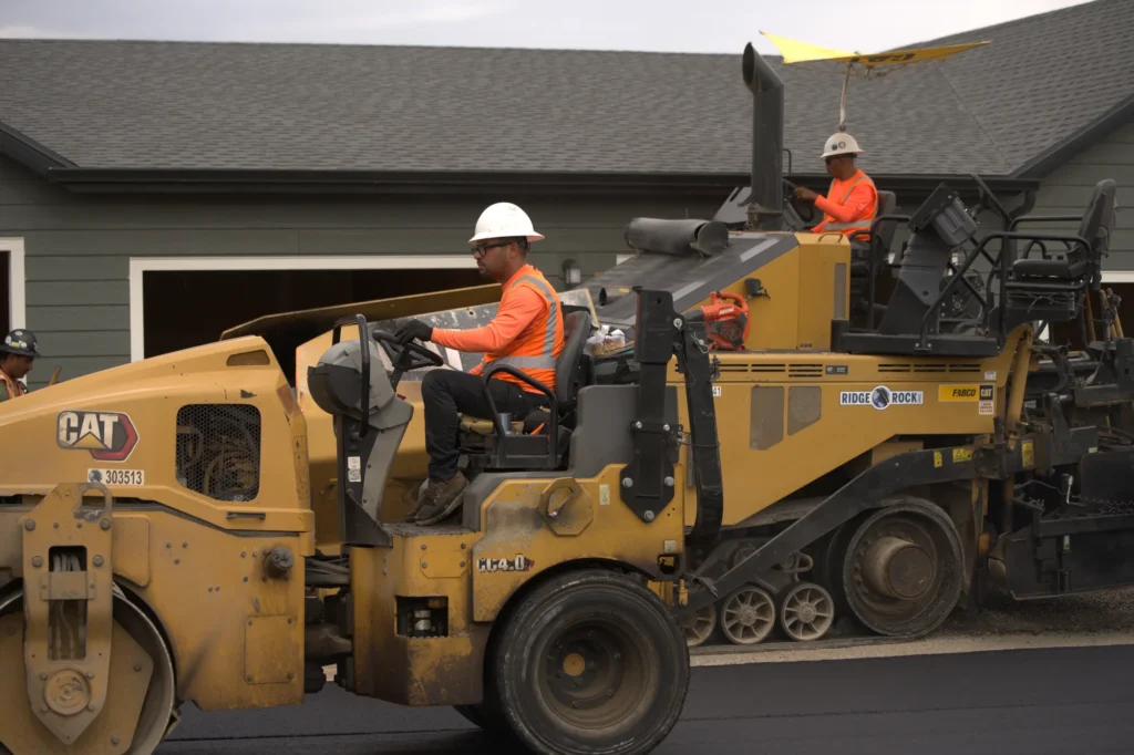 Roller Compacting Driveway Surface